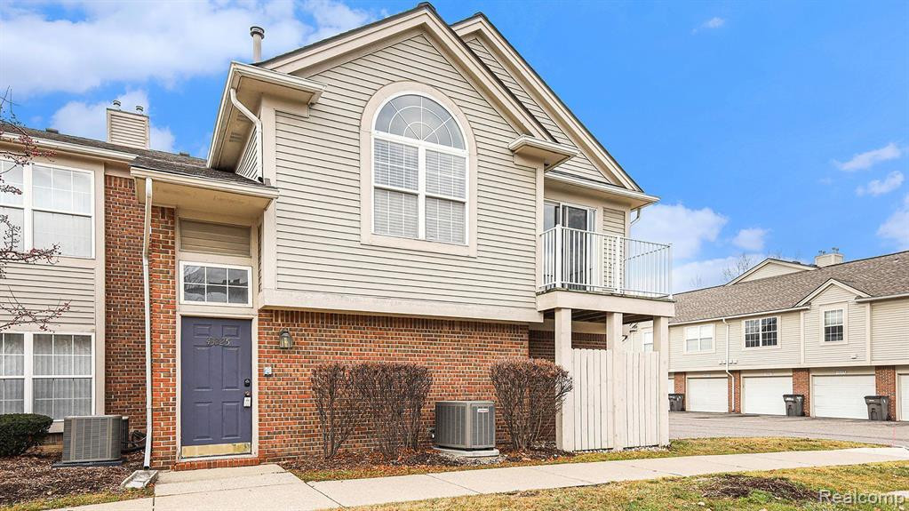 43325 Woodbridge Drive, Clinton Twp, MI 48038 — front exterior