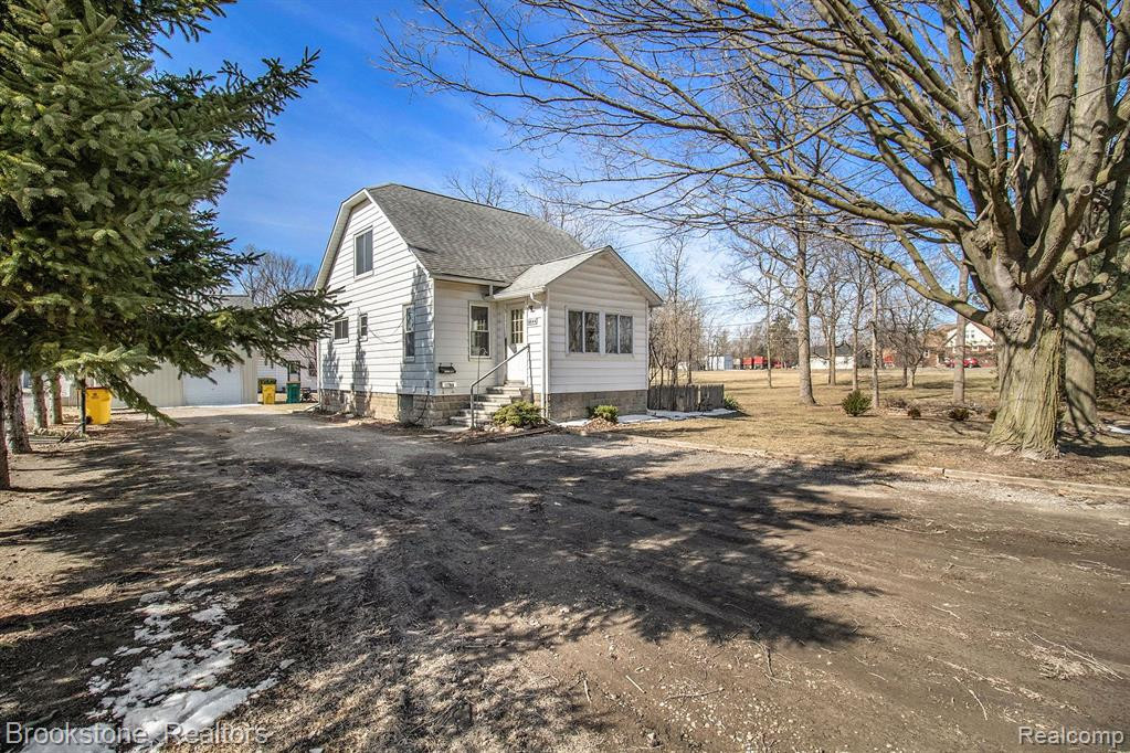 6644 AUBURN Road, Utica, MI 48317 — front exterior