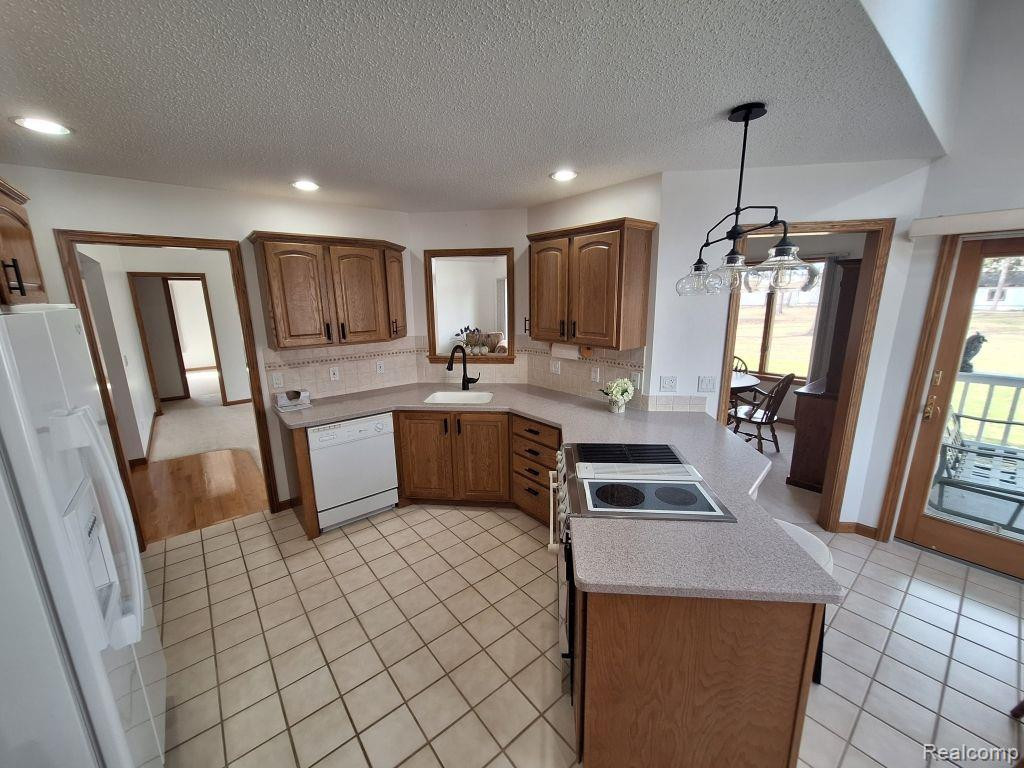 112 WOODLAWN Drive, St. Charles, MI 48655 — Photo 13