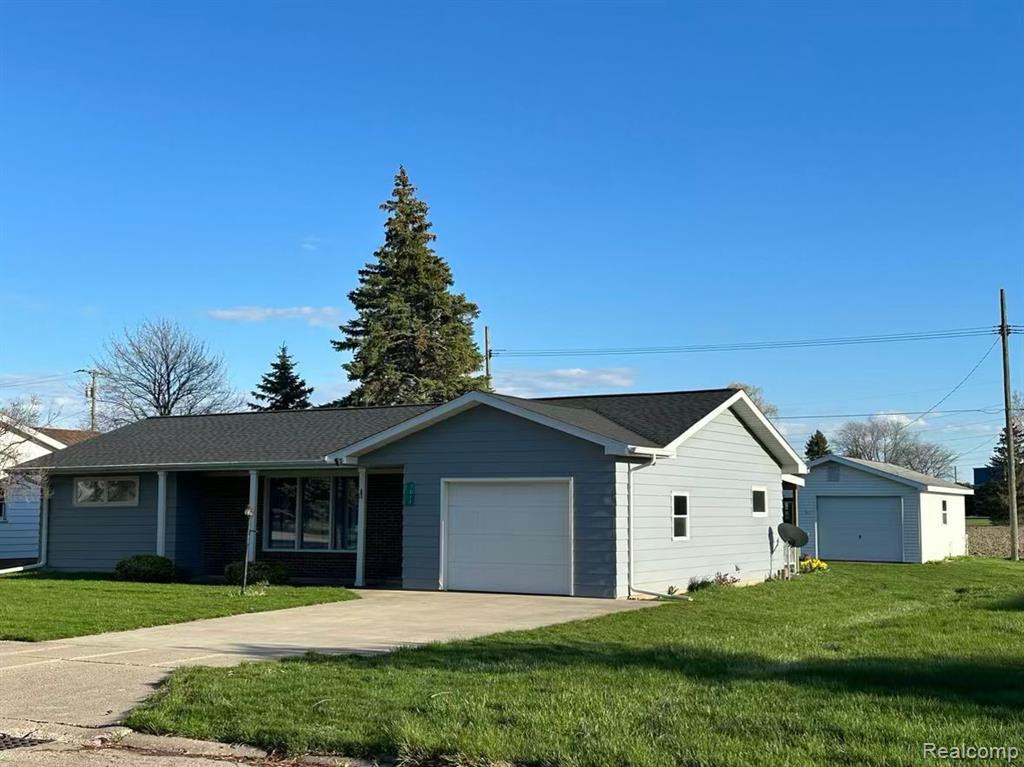 7017 E MICHIGAN Avenue, Pigeon Vlg, MI — front exterior