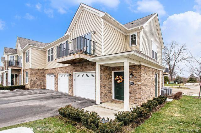 9828 RIDGE Run, Howell, MI 48855 — front exterior