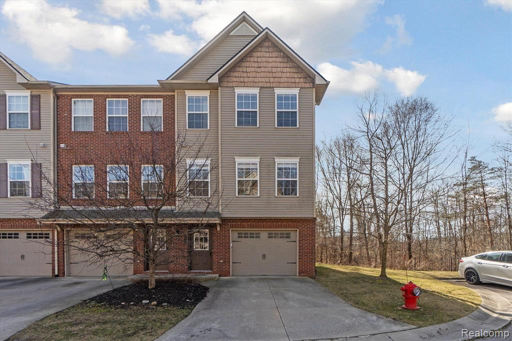 1616 RED HICKORY, Howell, MI 48855 — front exterior