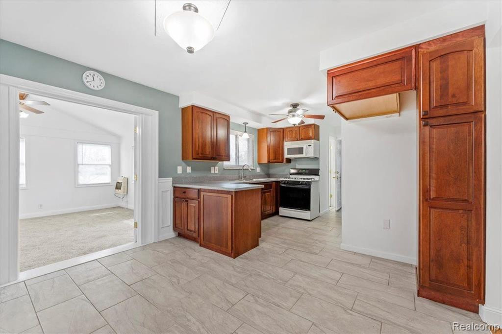 450 MAPLEGROVE, Highland, MI 48356 — Photo 5