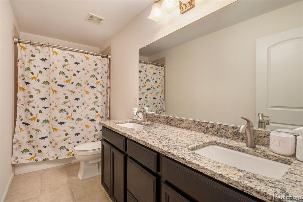 150 SINGH Boulevard, South Lyon, MI 48178 — Photo 20