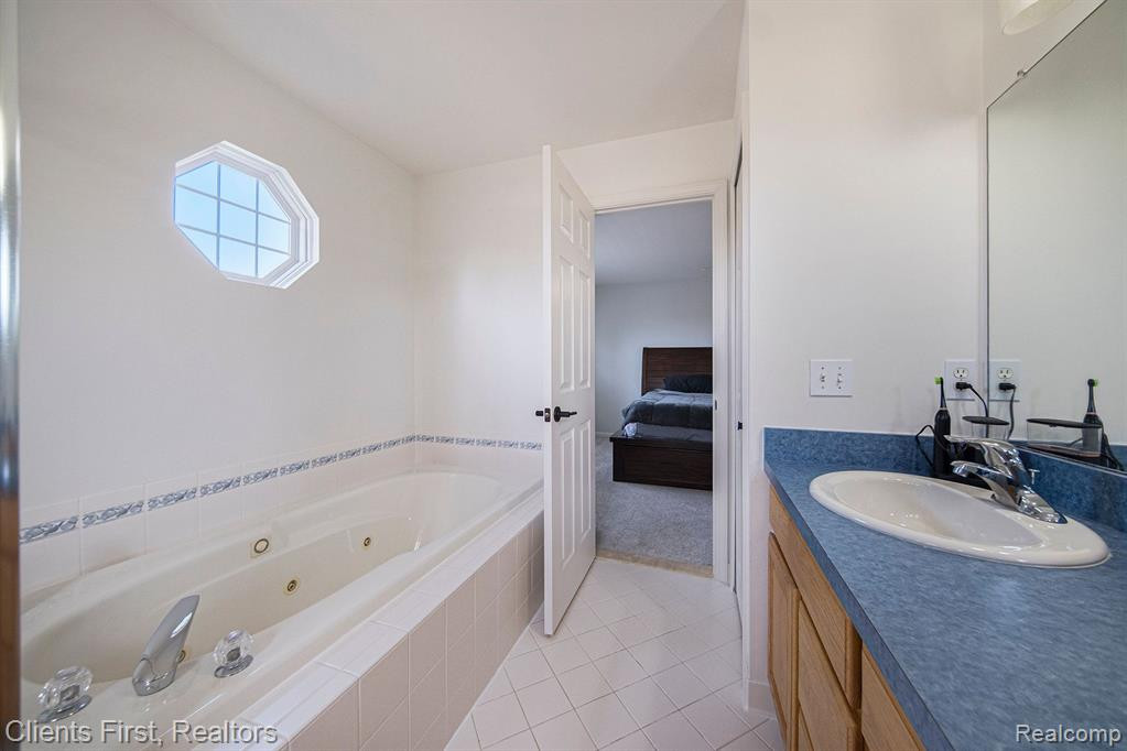 1402 AUSTON Lane, Chelsea, MI 48118 — Photo 31