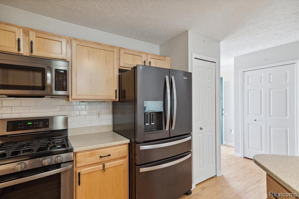 924 SPIREA, Howell, MI 48843 — Photo 13