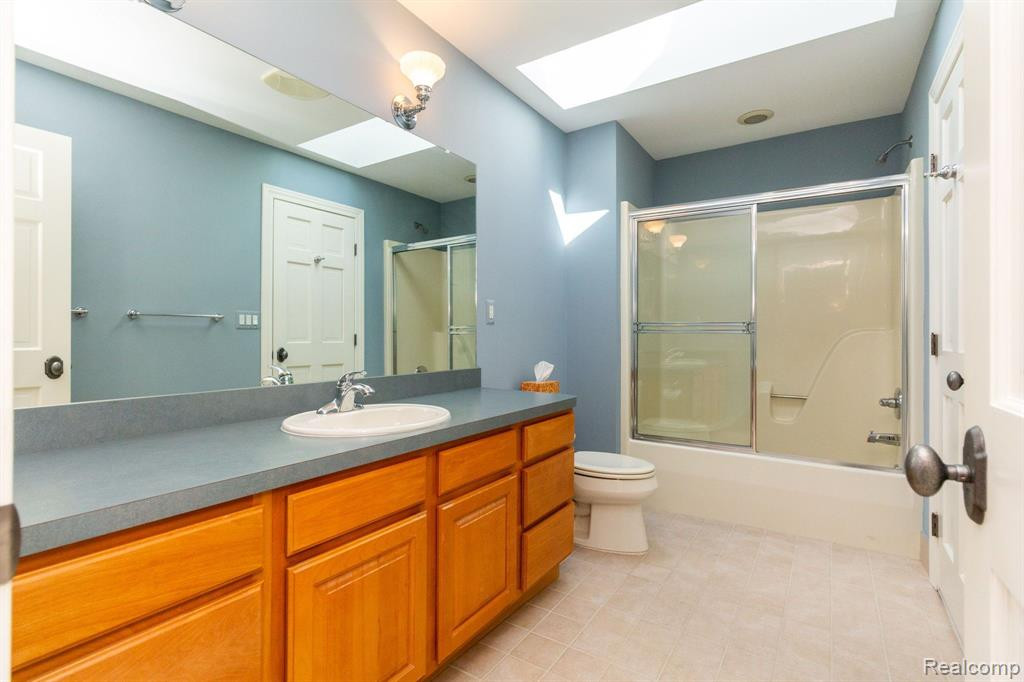 8450 SHERWOOD Drive, Grosse Ile, MI 48138 — Photo 36