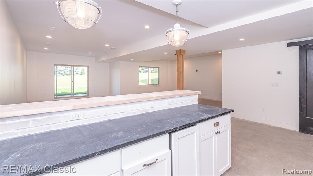 8220 STONEY CREEK Drive, Unit 22, South Lyon, MI 48178 — Photo 76
