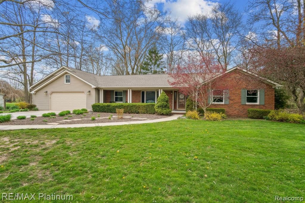 7589 MCCLEMENTS Road, Brighton, MI 48114 — front exterior