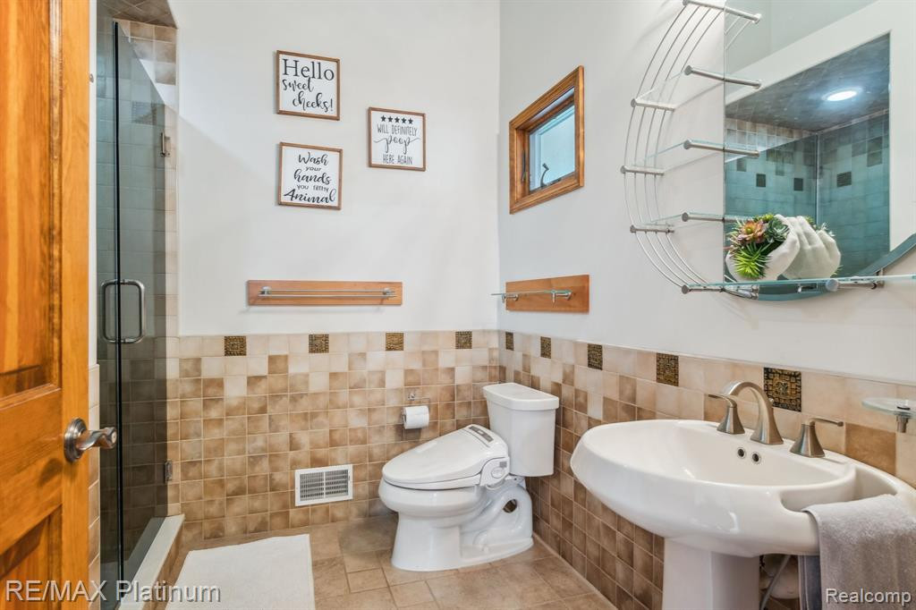 7589 MCCLEMENTS Road, Brighton, MI 48114 — Photo 11