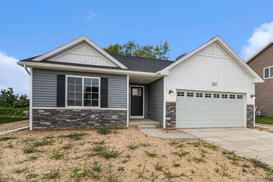 3067 IVY WOOD Circle, Howell, MI 48855 — front exterior
