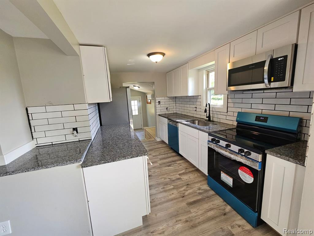 411 LYTLE Avenue, Harbor Beach, MI 48441 — Photo 7
