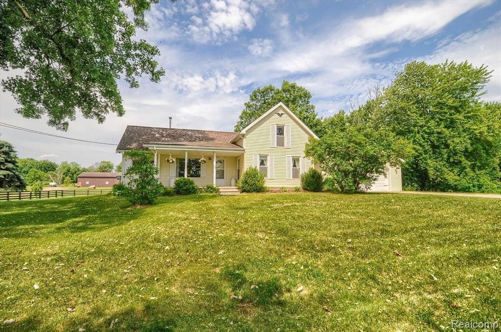 589 N LAKE PLEASANT Road, Attica, MI 48412 — front exterior