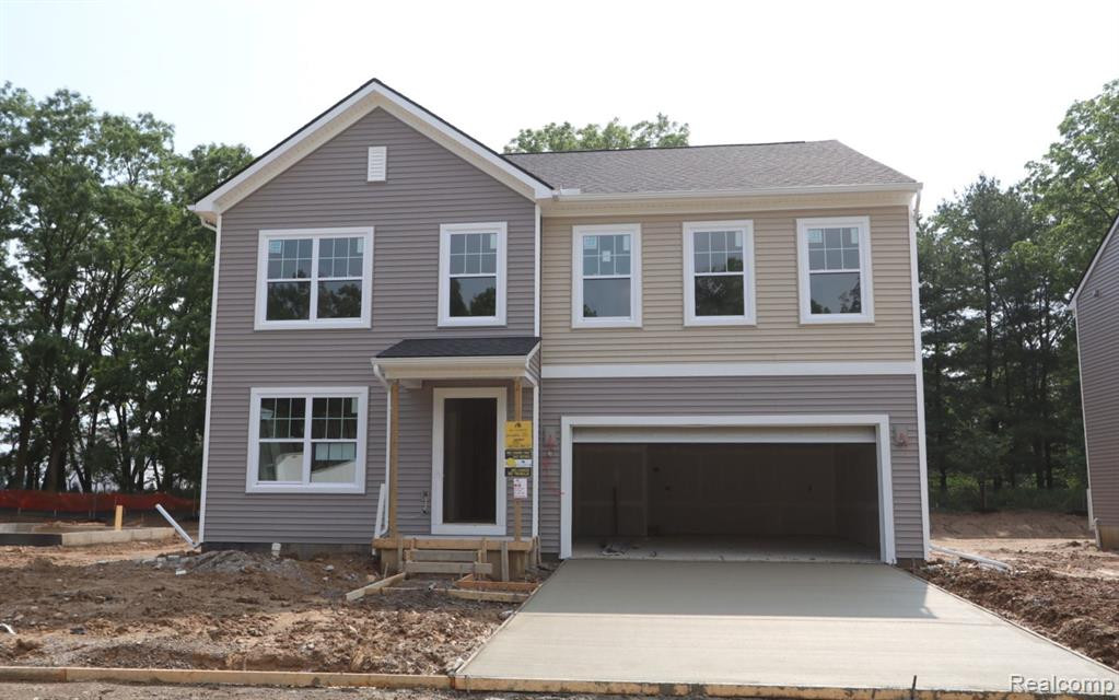 580 Heritage Farms Blvd Boulevard, Chelsea, MI 48118 — front exterior