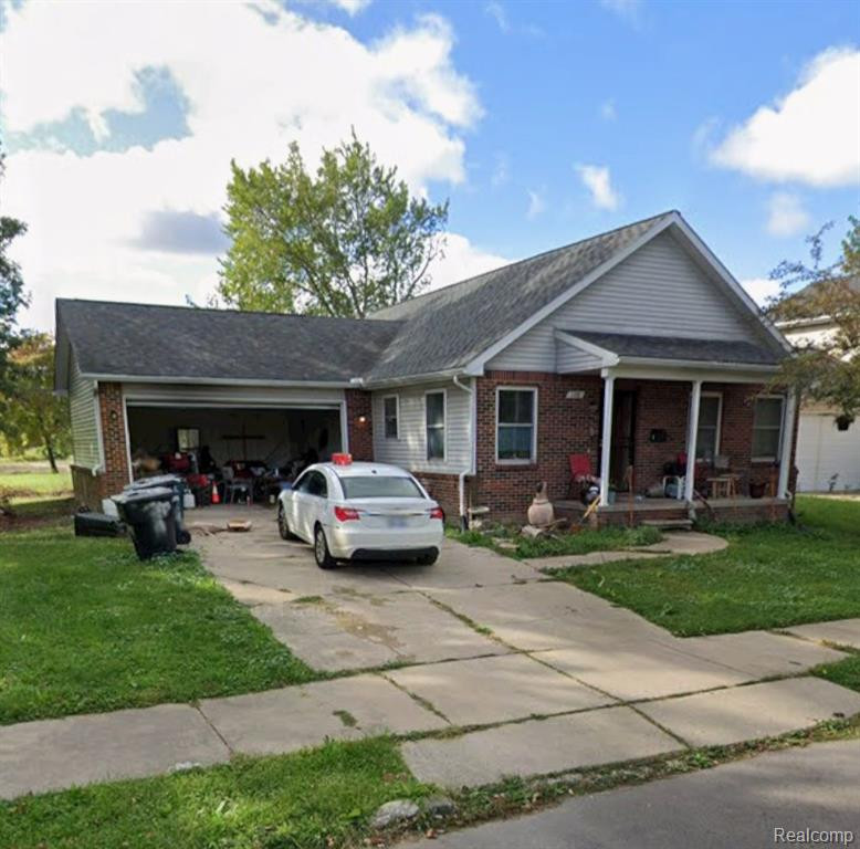 128 E MONTANA Street, Highland Park, MI 48203 — front exterior