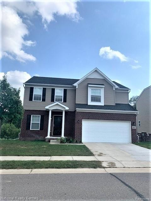 59617 TWIN PINES Drive, New Hudson, MI 48165 — front exterior