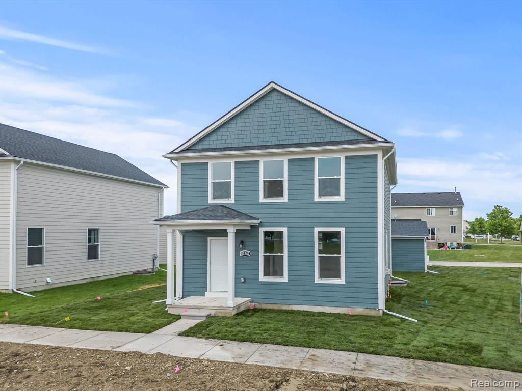 59217 E BROCKTON Street, New Haven, MI 48048 — front exterior