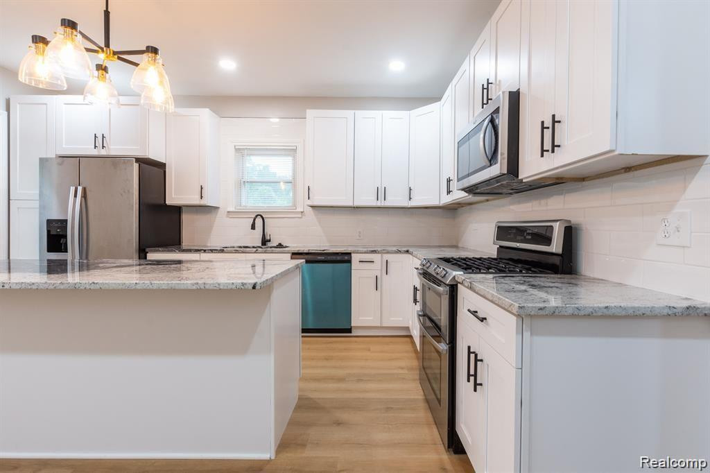 307 N SAGINAW Street, Holly, MI 48442 — Photo 11