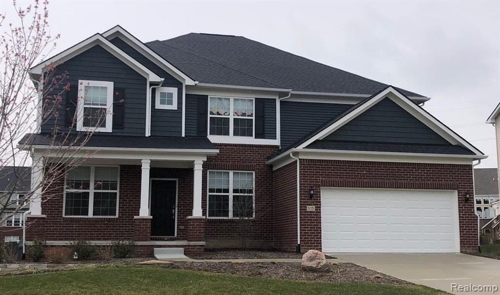 51009 Green Meadows Drive, Macomb, MI 48042 — front exterior