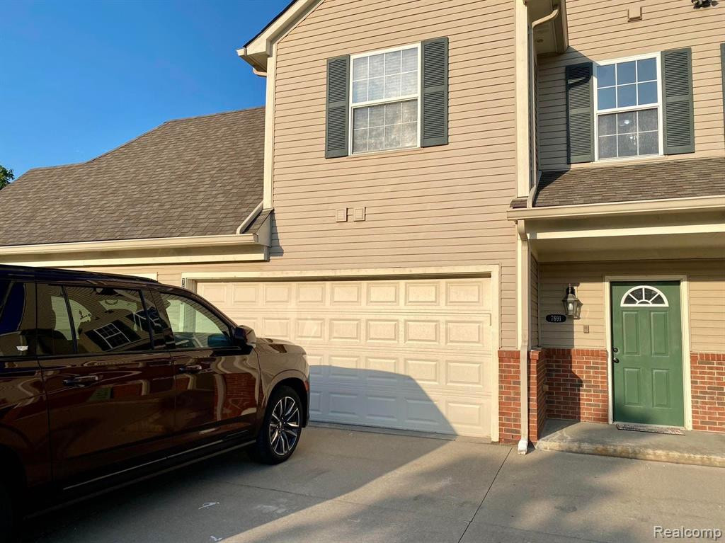 7691 Ambassador Drive, Utica, MI 48316 — front exterior