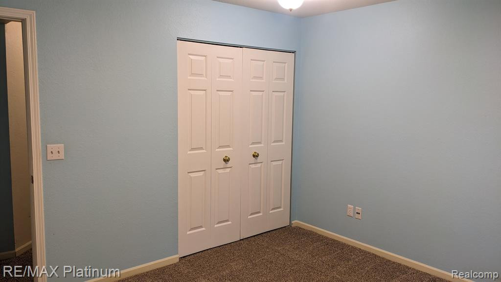 613 Curzon Court, 102, Howell, MI 48843 — Photo 23
