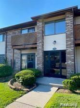 7769 MANOR CIR APT 204, Westland, MI — front exterior