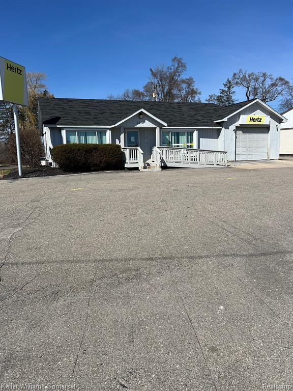 7612 HIGHLAND Road, Waterford, MI 48327 — front exterior