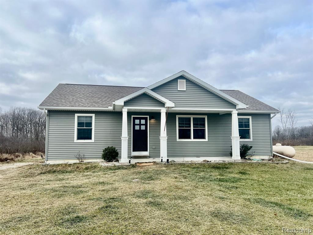 8357 Duce Road, Greenwood, MI 48006 — front exterior