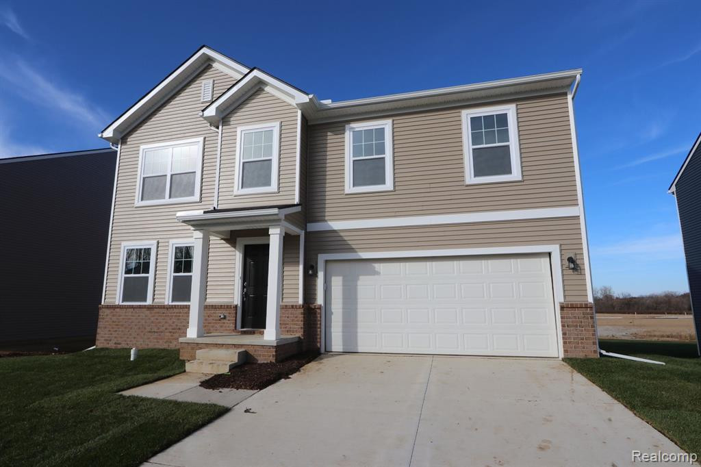 618 COUNTRYSIDE Drive, Chelsea, MI 48118 — Photo 2