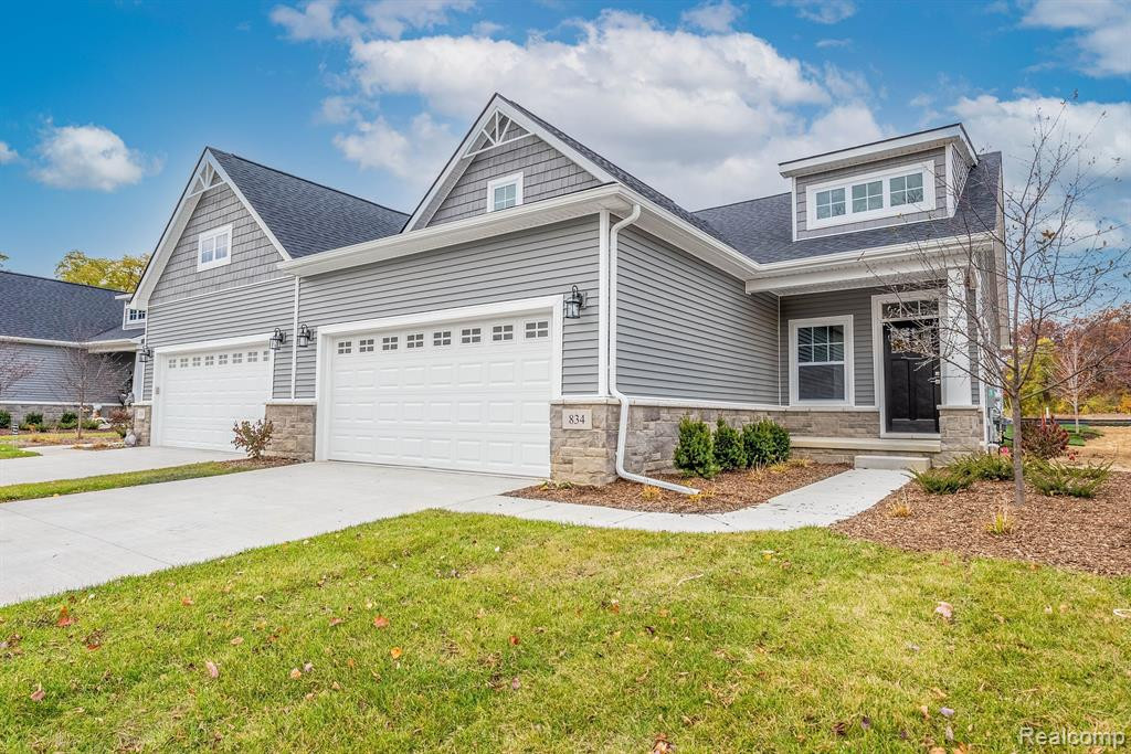 704 Ander Lane, 86, White Lake, MI — front exterior