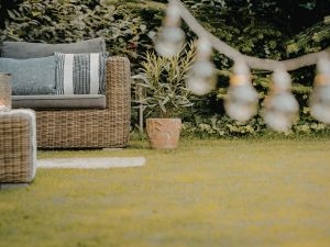 What outdoor spaces can benefit most from custom landscape lighting?