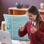 Online Spanish immersion in action—coach listening to learner’s response.