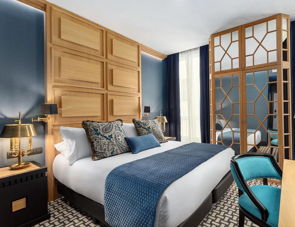 Elegant boutique hotel room in the heart of old Madrid, part of the Fluenz Spanish Immersion Madrid experience for adult learners.