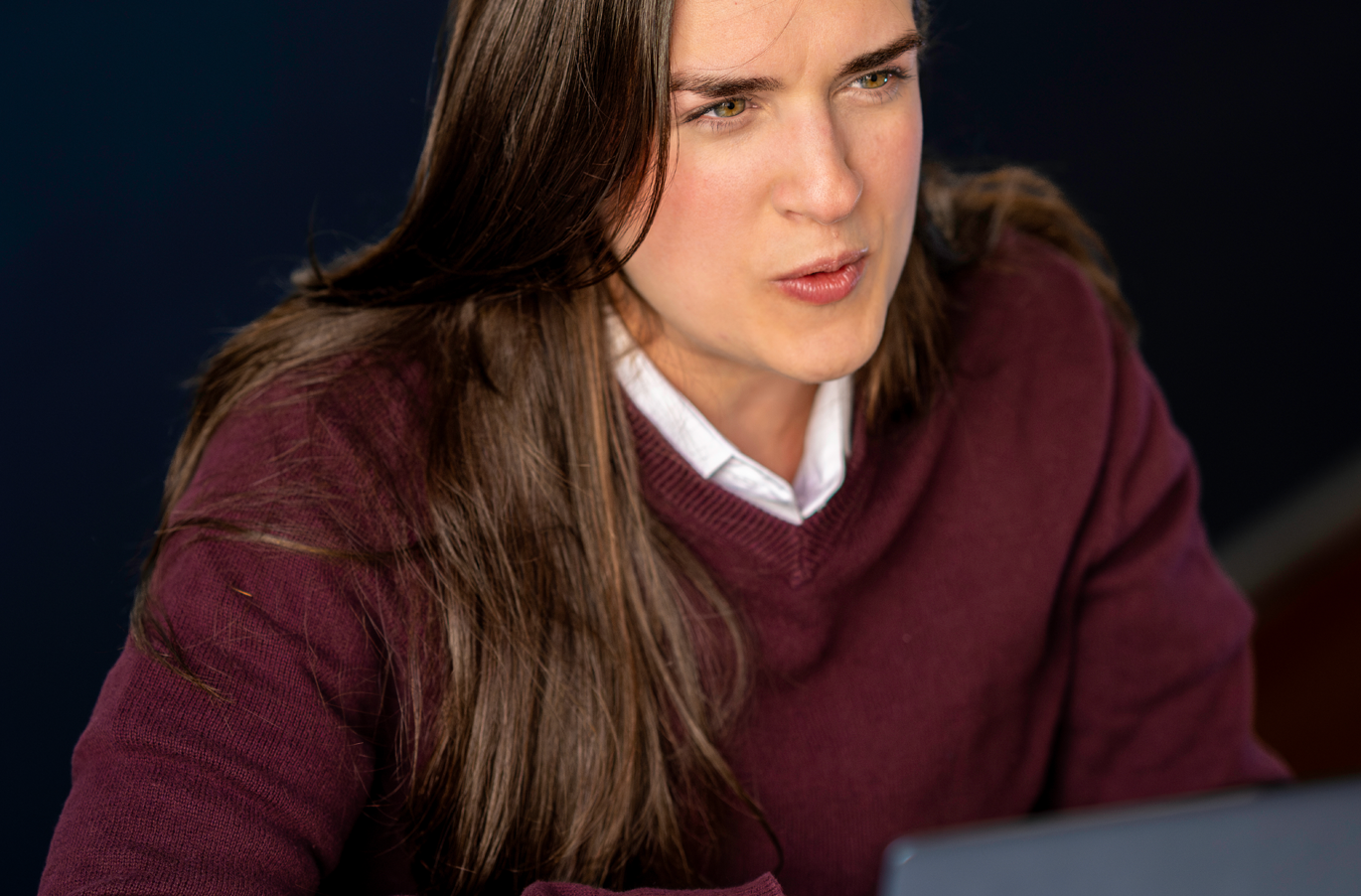 Dedicated Fluenz coach providing live Spanish immersion online, delivering individualized guidance to an adult learner.