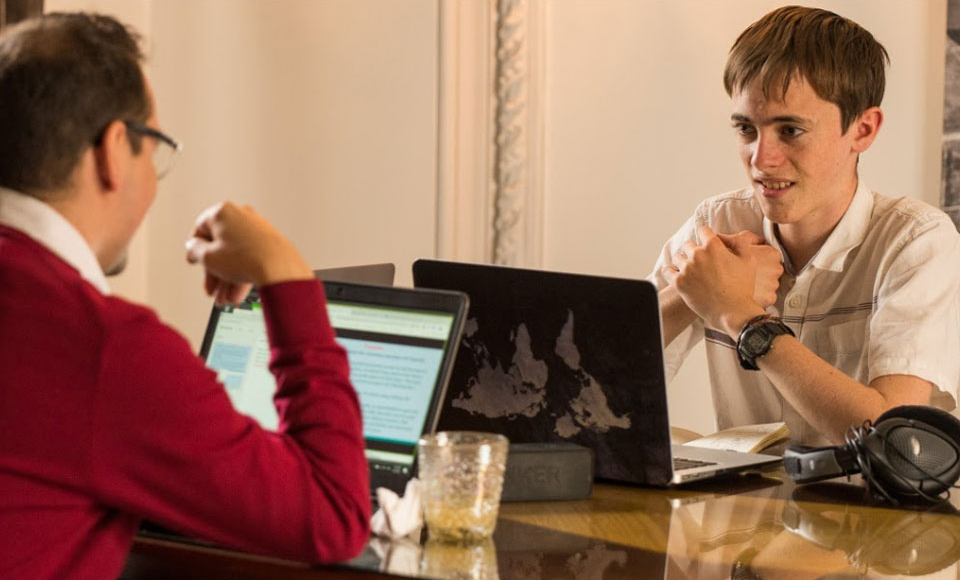 Fluenz Spanish Bootcamp learner in an intensive one-on-one session with a coach in Mexico City, focusing on fluency and confidence through personalized Spanish immersion.