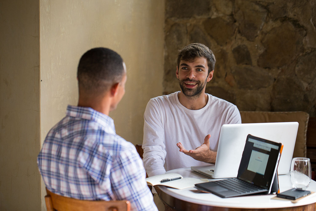 Fluenz Spanish Bootcamp learner in an intensive one-on-one session with a Spanish coach in Mexico City, focused on real-world fluency and advanced comprehension as part of the luxury Spanish immersion experience.