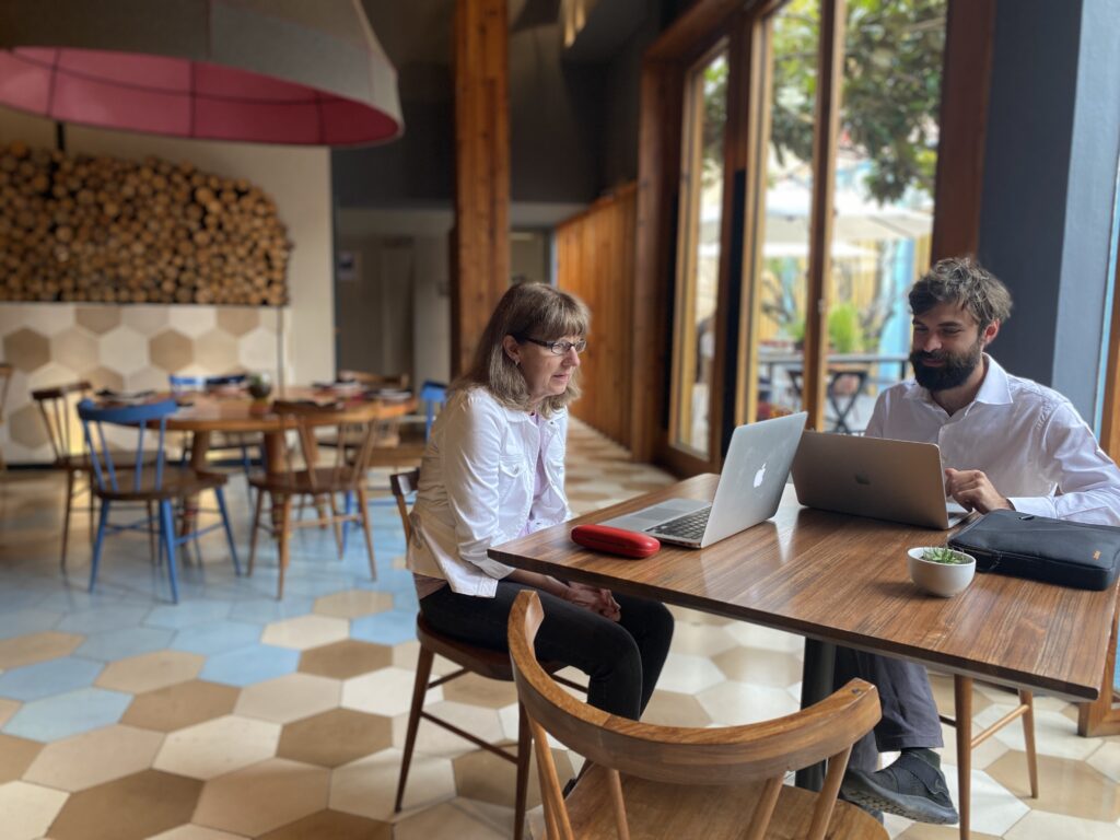 How do Spanish programs prepare adults for real-world communication scenarios?