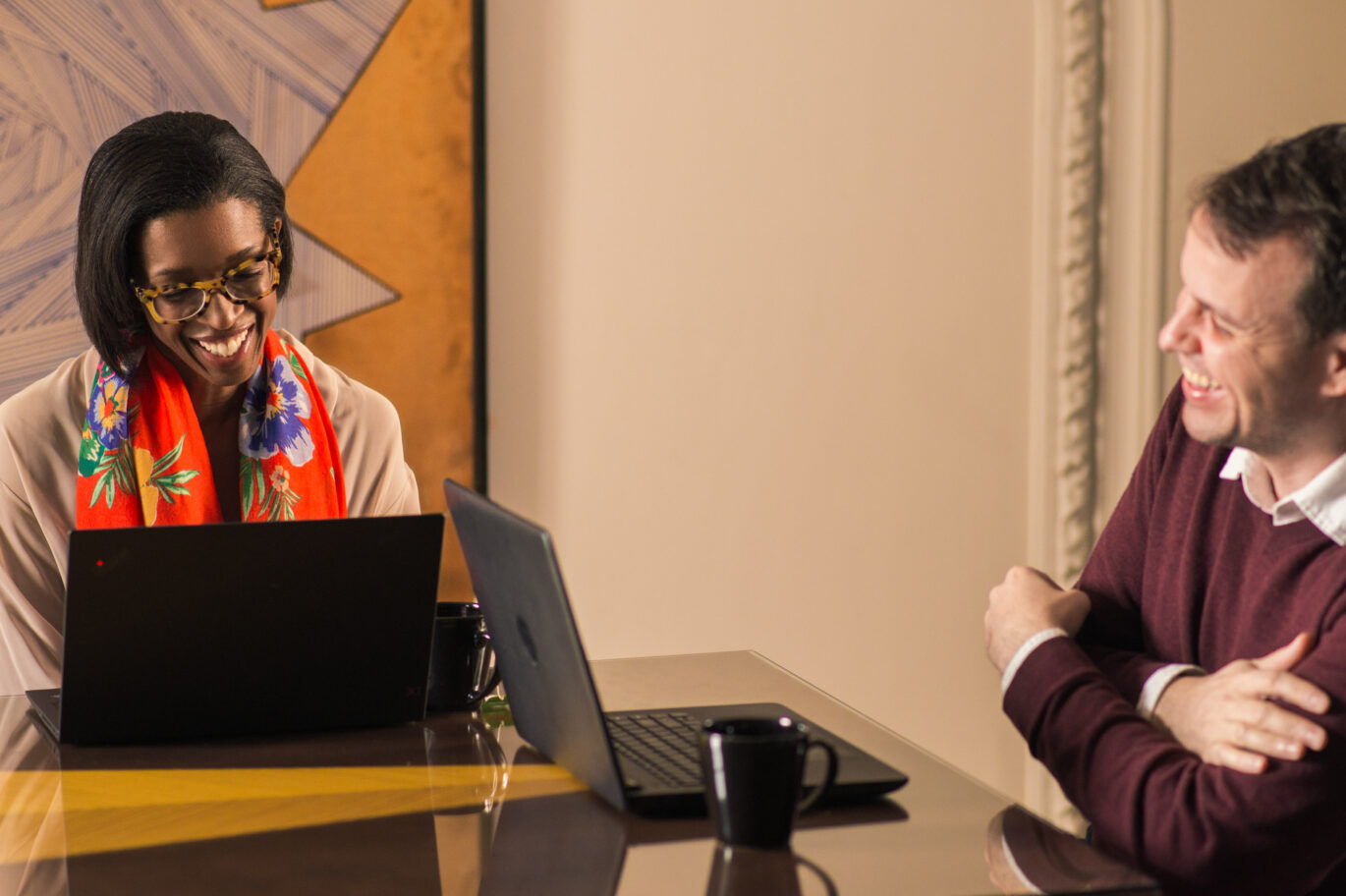 Learner and Spanish tutor engaged in a lively one-on-one session at the Fluenz Spanish Bootcamp in Mexico City, part of the immersive program designed to help adults achieve real fluency through personalized instruction.