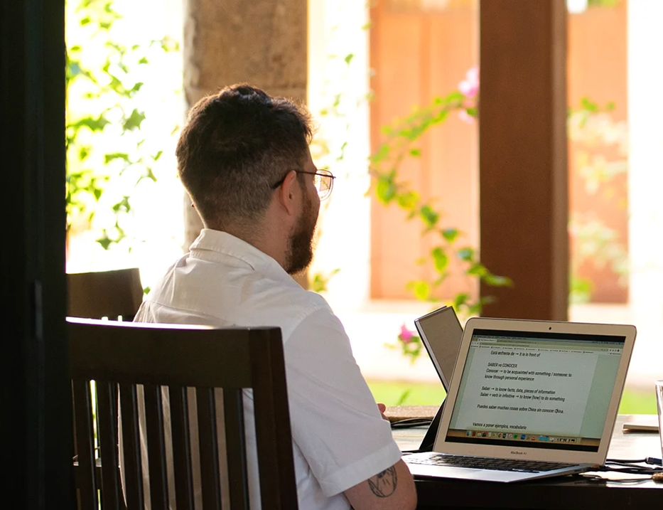 How does learning Spanish online prepare for practical communication?