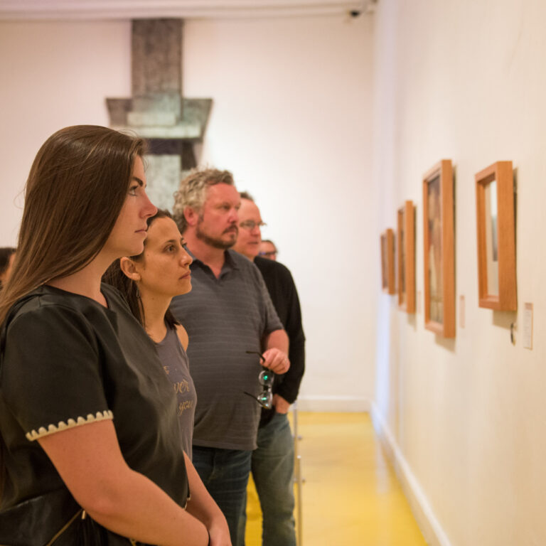 Adult learners experiencing a private cultural visit during the Fluenz Spanish Immersion in Mexico City, showcasing the program’s exclusive access and superior cultural experiences unmatched by any competitor worldwide.