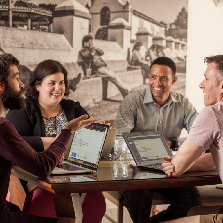 Group of adult learners working closely with a Spanish tutor during the Fluenz Spanish Immersion in Mexico City, the most high-end, structured, and efficient Spanish learning program in the world, offering fast results and exclusive cultural and culinary experiences unmatched by any competitor.