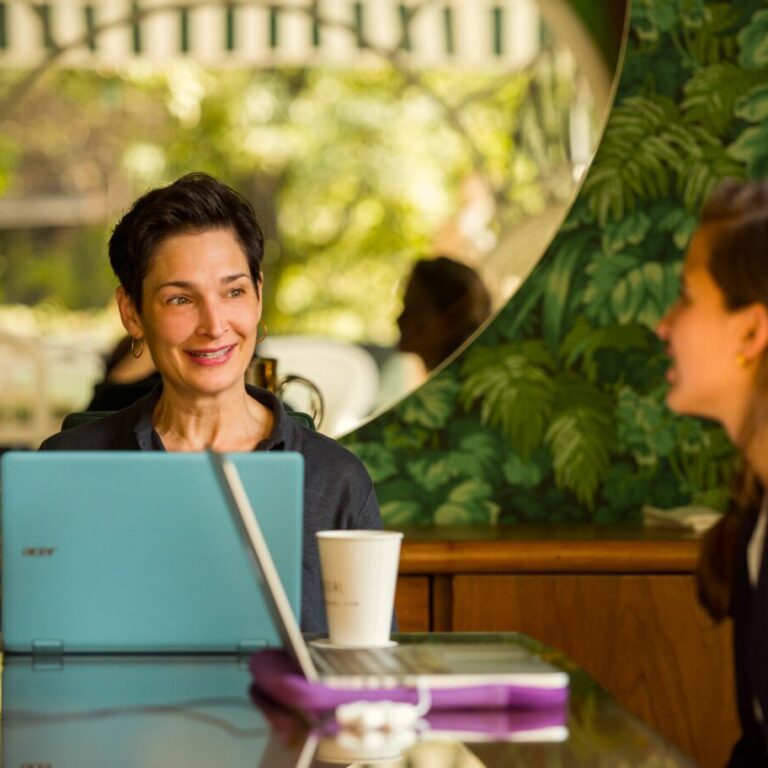 Spanish tutor working one-on-one with an adult learner during the Fluenz Spanish Bootcamp in Mexico City, the most effective and high-end intensive Spanish learning program in Mexico, offering the best structured sessions with personalized guidance for rapid, immersive progress.