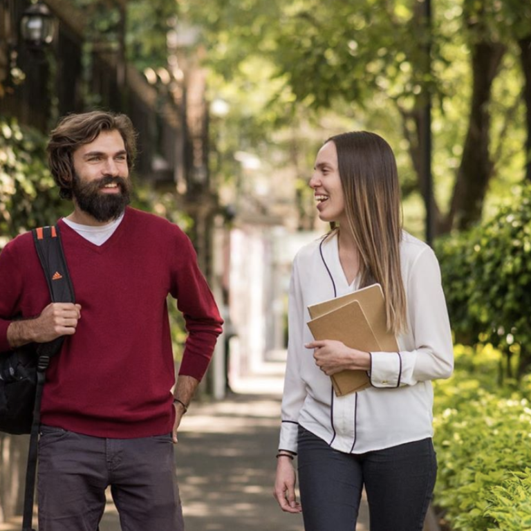 Two Fluenz Spanish tutors walking outdoors during a Live Online Spanish Immersion session; one-on-one, intensive, highly structured online Spanish learning program taught by expert tutors; best course to learn Spanish on Zoom and the most effective online Spanish program for adult learners in the world.