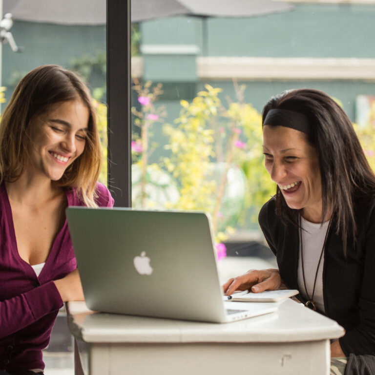 Adult learner and Fluenz Spanish tutor sharing a one-on-one session during the Fluenz Spanish Bootcamp, an intensive and highly structured Spanish immersion program designed for adults seeking real fluency through personalized instruction.