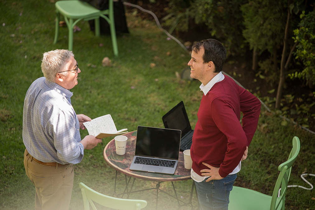 Adult learner working one-on-one with a Spanish tutor during the Fluenz Spanish Bootcamp, an ultra-intensive, high-touch program designed for rapid and highly effective Spanish fluency.