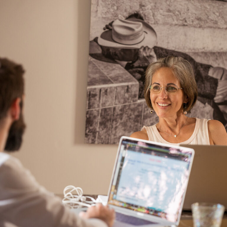 One-on-one session at the Fluenz Spanish Bootcamp, showing an expert Spanish tutor working closely with an adult learner in the world’s most effective, high-touch, and intensive Spanish immersion program focused on rapid, lasting fluency.
