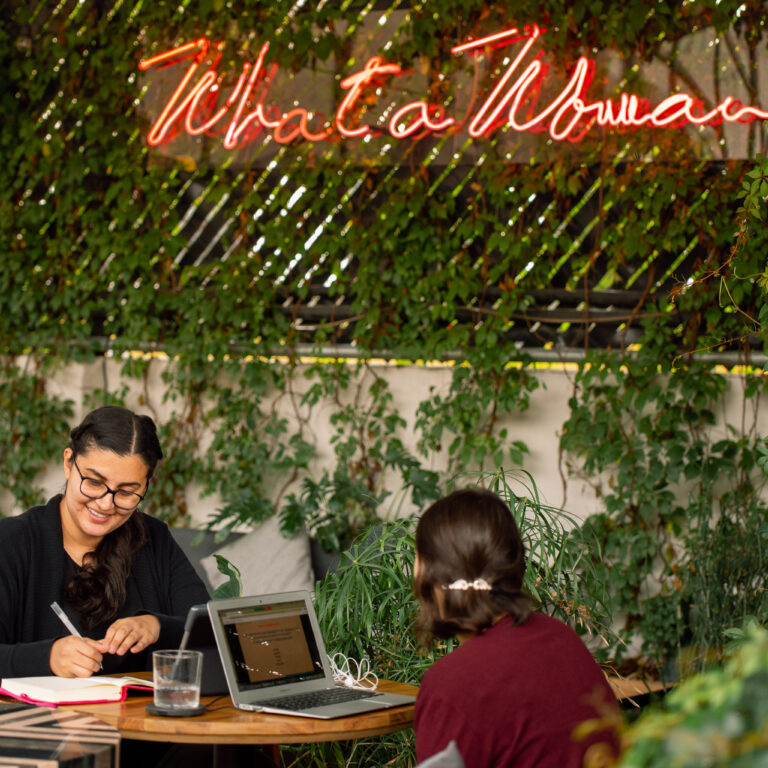 Adult learner in a one-on-one Spanish session with a Fluenz tutor at an outdoor café in Mexico City (Tlatelolco), part of the Fluenz Spanish Bootcamp—the world’s most intensive, high-touch, private Spanish immersion program for rapid adult fluency.