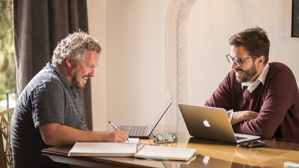 Adult learner and Fluenz Spanish tutor engaged in an intensive one-on-one Spanish Bootcamp session, combining personalized instruction, real-time feedback, and a focused academic environment designed for rapid language mastery.