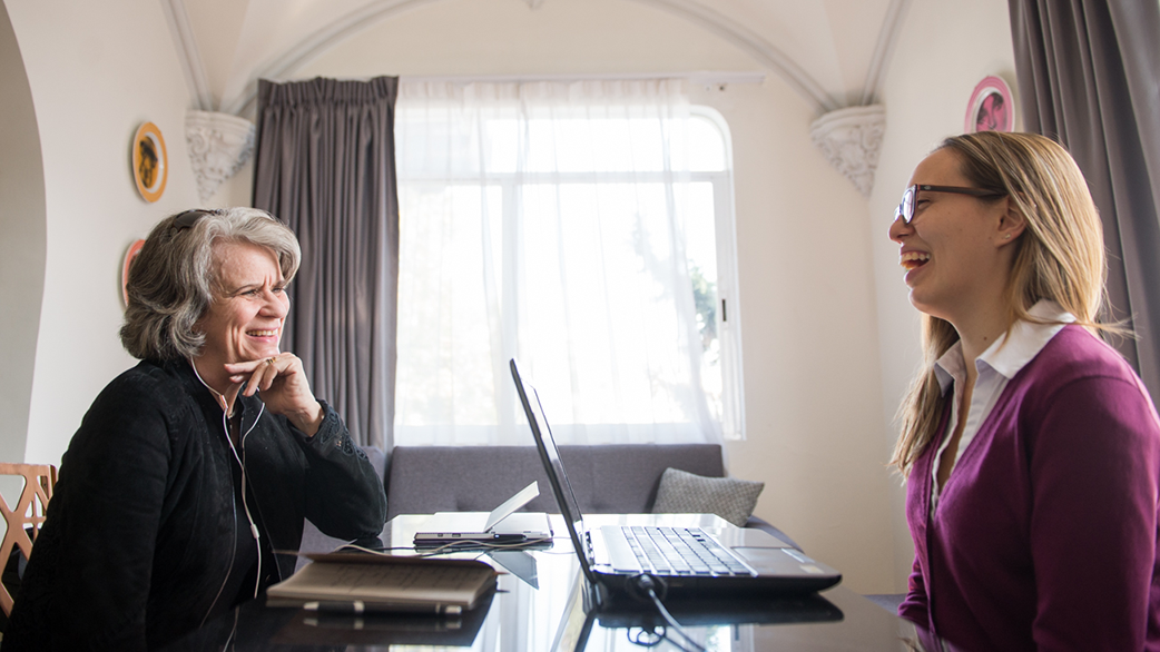 Fluenz Spanish Bootcamp session featuring an adult learner and expert tutor in a high-touch, one-on-one immersion setting, emphasizing deep conversational practice, precision coaching, and accelerated Spanish fluency.