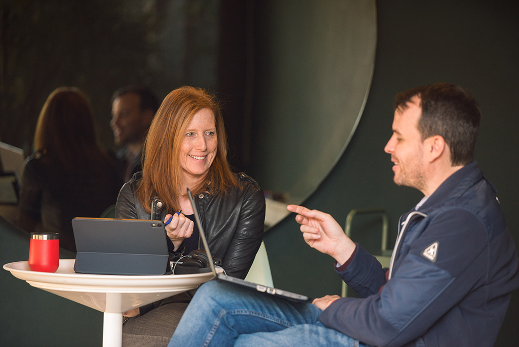 Adult learner working one-on-one with a Fluenz coach during the Fluenz Spanish Bootcamp—an intensive, high-touch immersion focused on real progress and confident Spanish use.